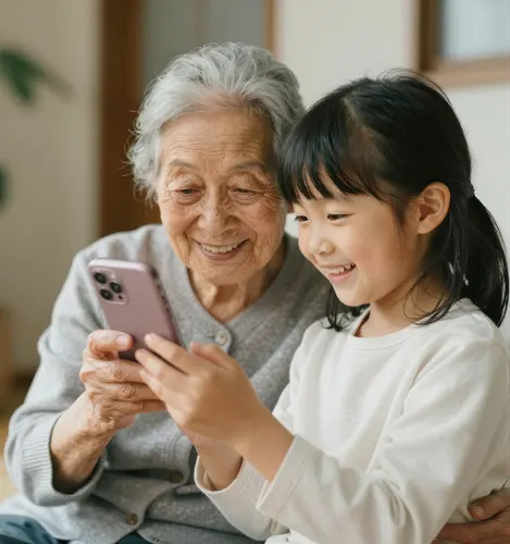 フリーAI画像, CC0 AI画像, 写真（AI画像）, 人物（AI画像）, 家族（AI画像）, おばあさん, 孫, 女の子, スマートフォン（スマホ）, 二人